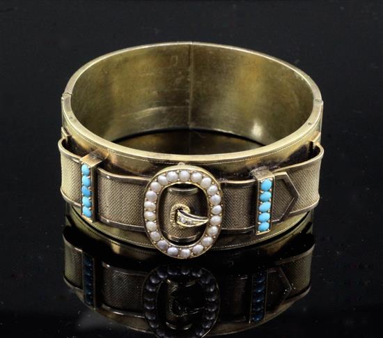 A Victorian gold, turquoise, seed pearl and diamond set hinged buckle bracelet, in fitted case (a.f.).